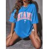 imageVerdusa Womens Summer Oversized Cute Shirt Graphic Print Short Sleeve Tunic Tops Casual Loose Drop Shoulder Crew Neck TeeBlue
