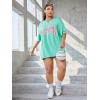 imageVerdusa Womens Summer Oversized Cute Shirt Graphic Print Short Sleeve Tunic Tops Casual Loose Drop Shoulder Crew Neck TeePlus Mint Green