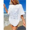 imageVerdusa Womens Summer Oversized Cute Shirt Graphic Print Short Sleeve Tunic Tops Casual Loose Drop Shoulder Crew Neck TeeWhite