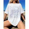 imageVerdusa Womens Summer Oversized Cute Shirt Graphic Print Short Sleeve Tunic Tops Casual Loose Drop Shoulder Crew Neck TeeWhite