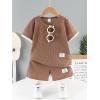 imageVerdusa Boys 2 Piece Casual Summer Outfits Waffle Knit Short Sleeve T Shirt and Track Shorts SetsBrown