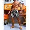 imageVerdusa Mens Drawstring Waist Swimwear Beach Shorts Swim Trunks with PocketsBlack and White