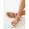imageVerdusa Womens Metallic Open Toe Thong Sandals Summer Strappy Flat SandalsBeige
