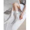 imageVerdusa Womens Bow Cute Socks Casual Mid Calf SocksWhite and Black